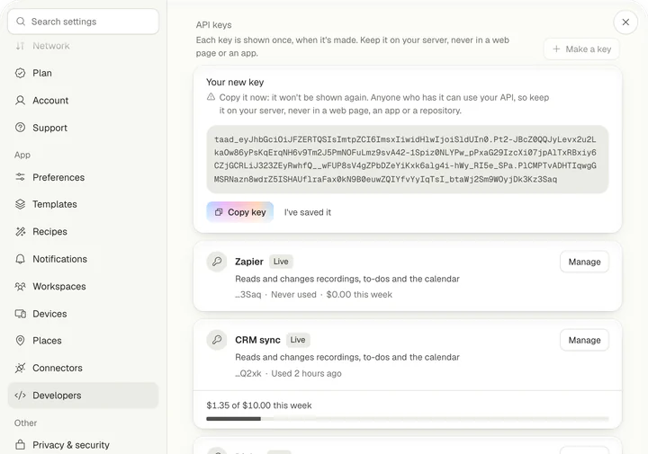 Your new key: a long token starting taad_, with Copy key and I've saved it, and the new key listed below
